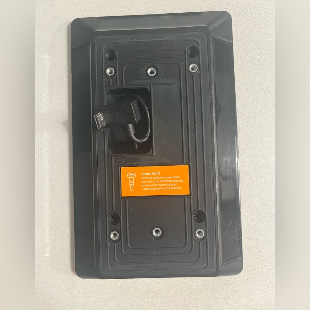 Ring Black Wall Mount with Orange Label